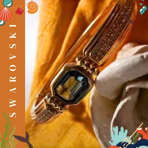 Swarovski Jewelry - Swarovski Blue Crystal Gold-Plated Bangle Bracelet